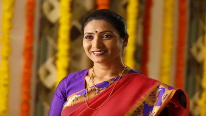 Renowned film actress Amani wearing a saffron scarf